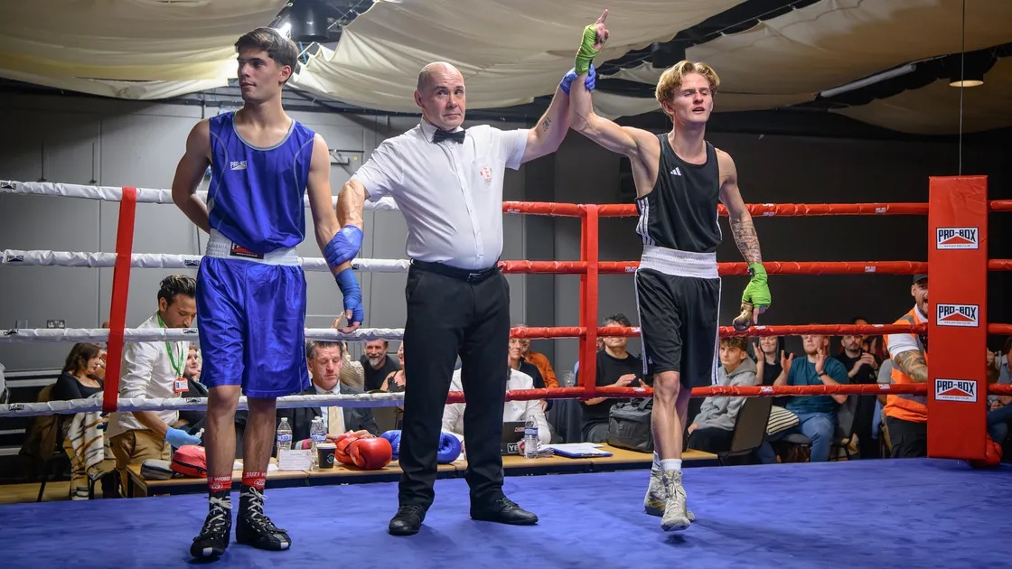 Arnie Watson raises an arm in victory at Saturday's October Fight Night.