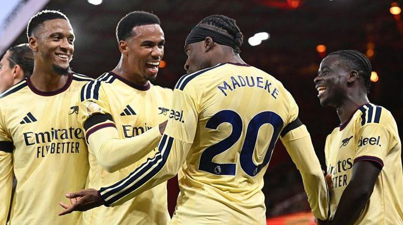 Arsenal players celebrate Noni Madueke's goal for Arsenal 