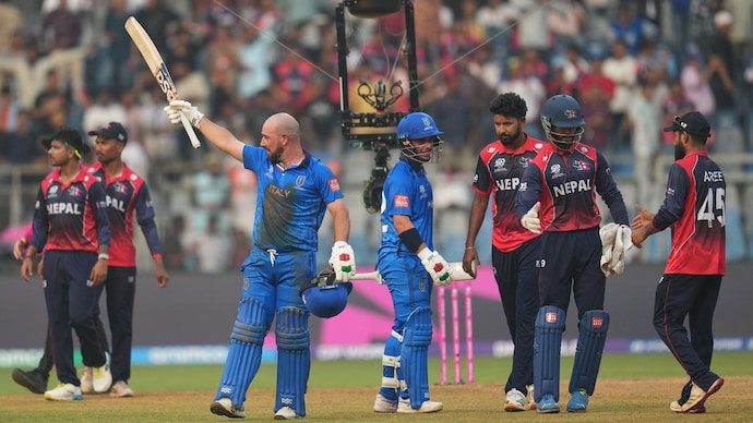 Anthony Mosca, Justin Mosca, celebrate after beating Nepal (AP Photo)