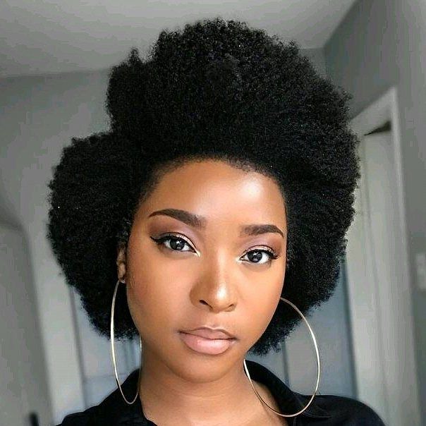 Deep Side-Parted Afro----The classic Afro style for natural hair gets a  slightly modern twist w… | Short natural hair styles, Womens hairstyles,  Natural hair styles