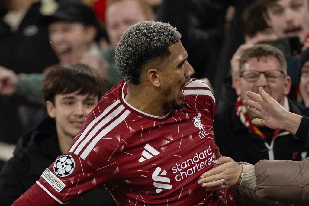Liverpool center-back Ronald Araujo celebrates with the Anfield crowd.