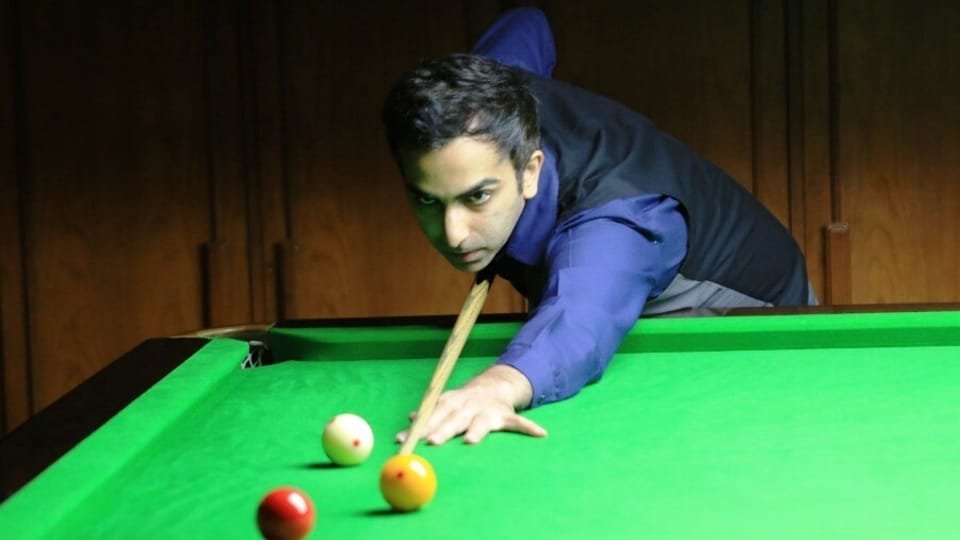 The summit match began with Advani scoring a 91 break