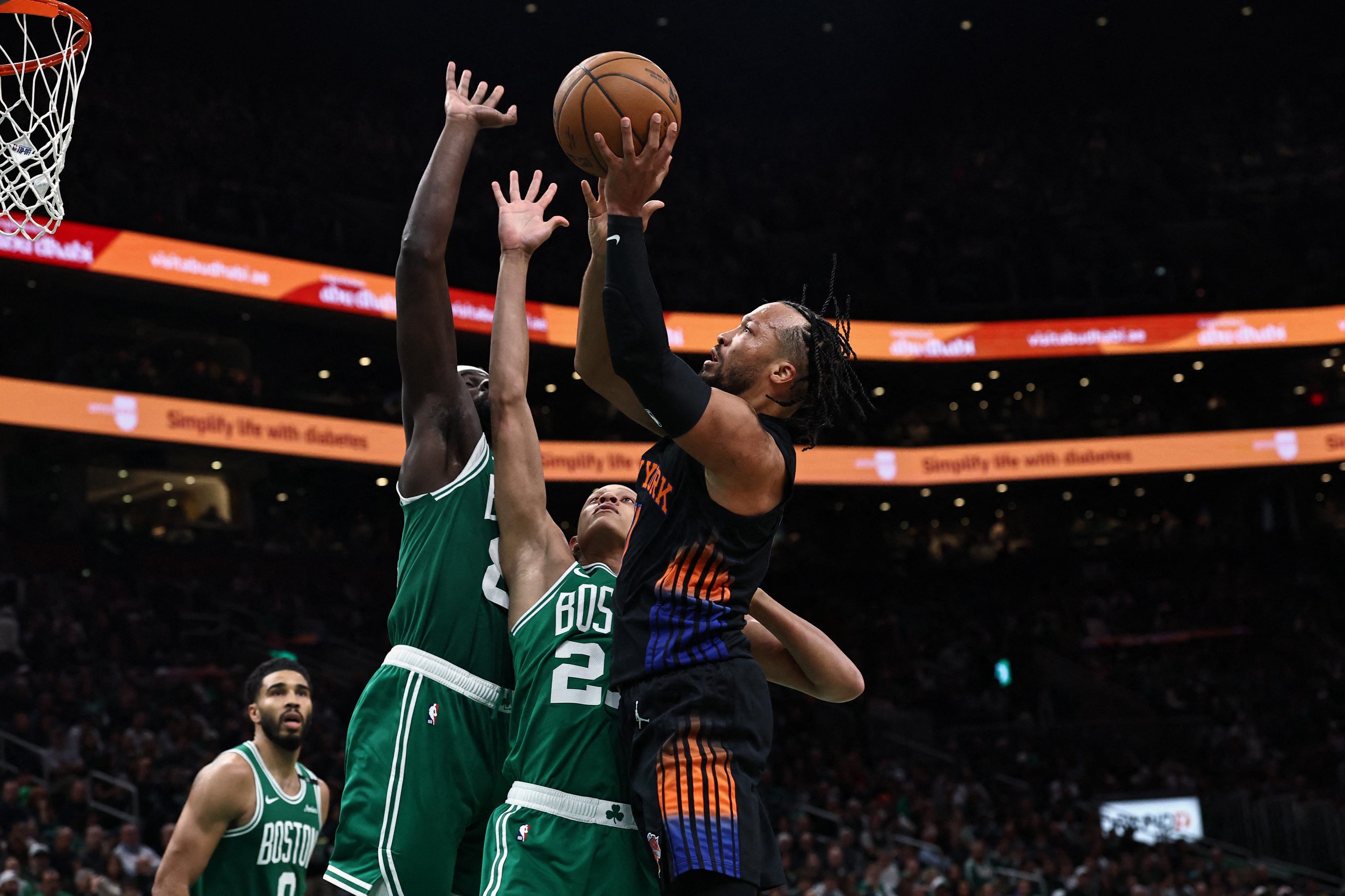 Oct 23, 2026; Boston, Massachusetts, USA; New York Knicks guard Jalen Brunson (11) shoots against Boston Celtics center Neemias Queta (88) and guard Jordan Walsh (27) during the second quarter at TD Garden. Mandatory Credit: Winslow Townson-Imagn Images