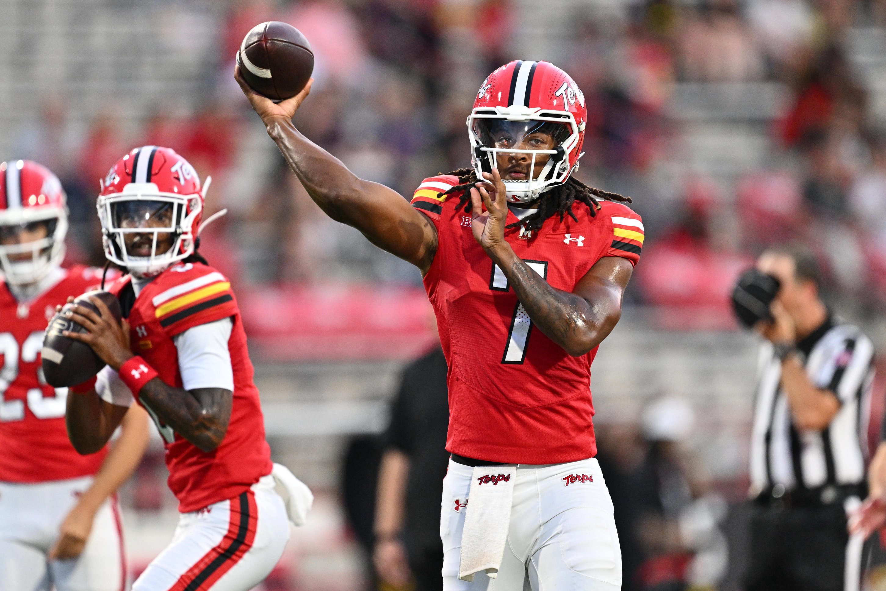 Sep 5, 2026; College Park, Maryland, USA;  Maryland Terrapins quarterback Malik Washington (7) warms up before a game against the Hampton Pirates at SECU Stadium. Mandatory Credit: Jamie Sabau-Imagn Images