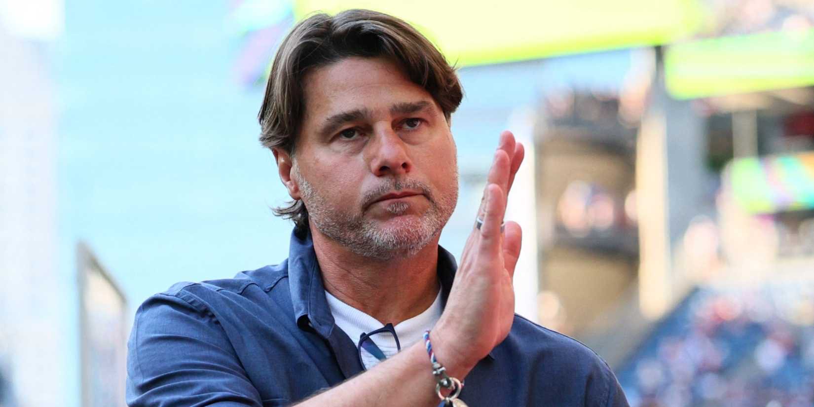 U.S. coach Mauricio Pochettino looks dejected after losing to Belgium