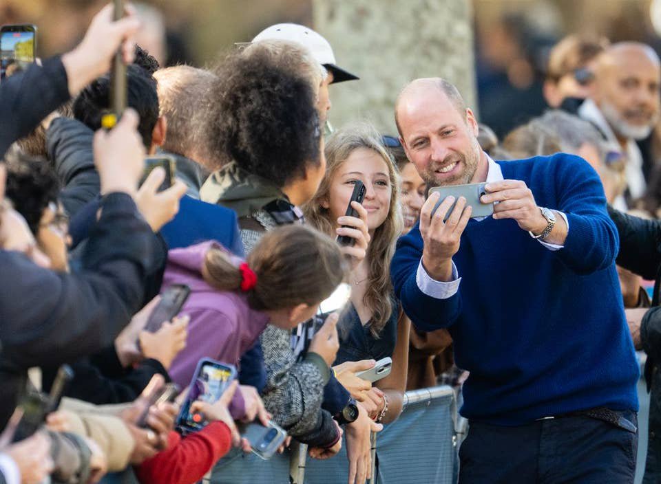 prince william holding phone for selfie