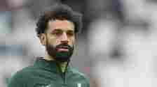 Mohamed Salah of Liverpool warms up before the Premier League match between West Ham United and Liverpool FC