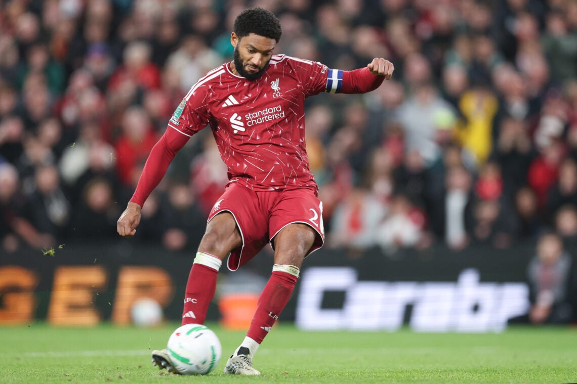 Joe Gomez scores his penalty during the shootout between Liverpool and Chelsea in the Carabao Cup fourth round clash at Anfield.
