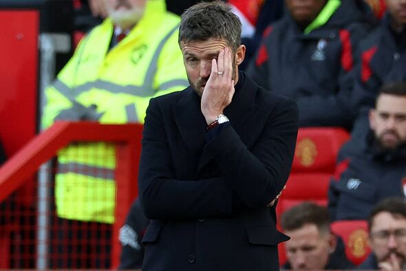 Michael Carrick gestures on the touchline