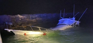 Power boat crashes into Southern California jetty, killing 1 and injuring 10