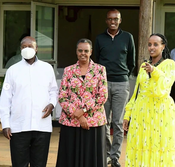 Musveni, his wife Janet pose with their daughter Natasha and son-in-law Edwin Karugire