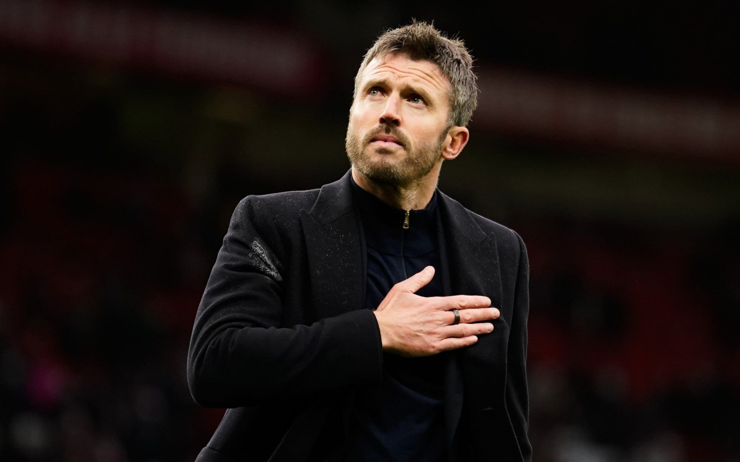 Michael Carrick reacts to supporters