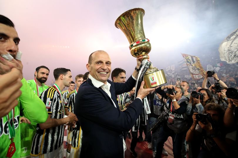 Massimiliano Allegri, Head Coach of Juventus, lifts the Coppa Italia trophy after the team's victory during the Coppa Italia 2023/2024 Final match between Atalanta BC and Juventus FC