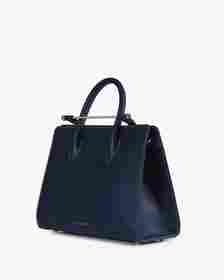 <p><a href="https://go.redirectingat.com?id=74968X1596630&url=https%3A%2F%2Fus.strathberry.com%2Fproducts%2Fthe-strathberry-midi-tote-navy-with-vanilla-stitch&sref=https%3A%2F%2Fwww.harpersbazaar.com%2Ffashion%2Ftrends%2Fg39675430%2Fbest-leather-totes%2F" rel="nofollow noopener" target="_blank" data-ylk="slk:Shop Now;elm:context_link;itc:0;sec:content-canvas" class="link rapid-noclick-resp">Shop Now</a></p><p>Midi Tote</p><p>strathberry.com</p><p>$845.00</p><span class="copyright">Strathberry</span>