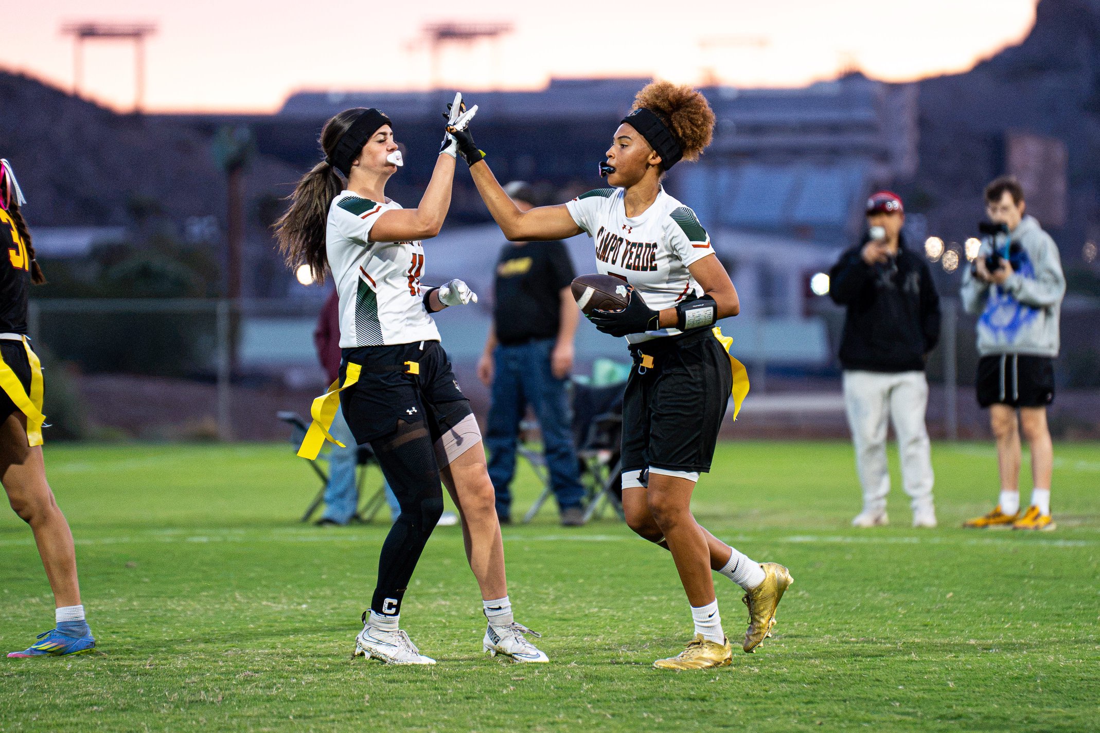 Campo Verde players Oakley Dobratz-Blevins (left) and Jaiyana Bogan-Jacobs (right) celebrate a touchdown in the Copper State Invitational final in Tempe on Oct. 17, 2026.