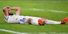 Nacho Fernandez lying on the turf for Real Madrid
