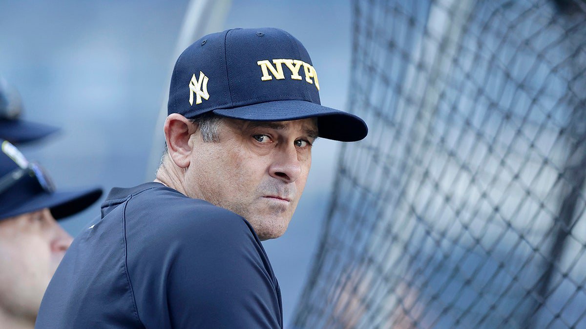 Manager Aaron Boone of the New York Yankees looks on during batting practice before a game against the Kansas City Royals at Yankee Stadium on September 11, 2024 in New York City.
