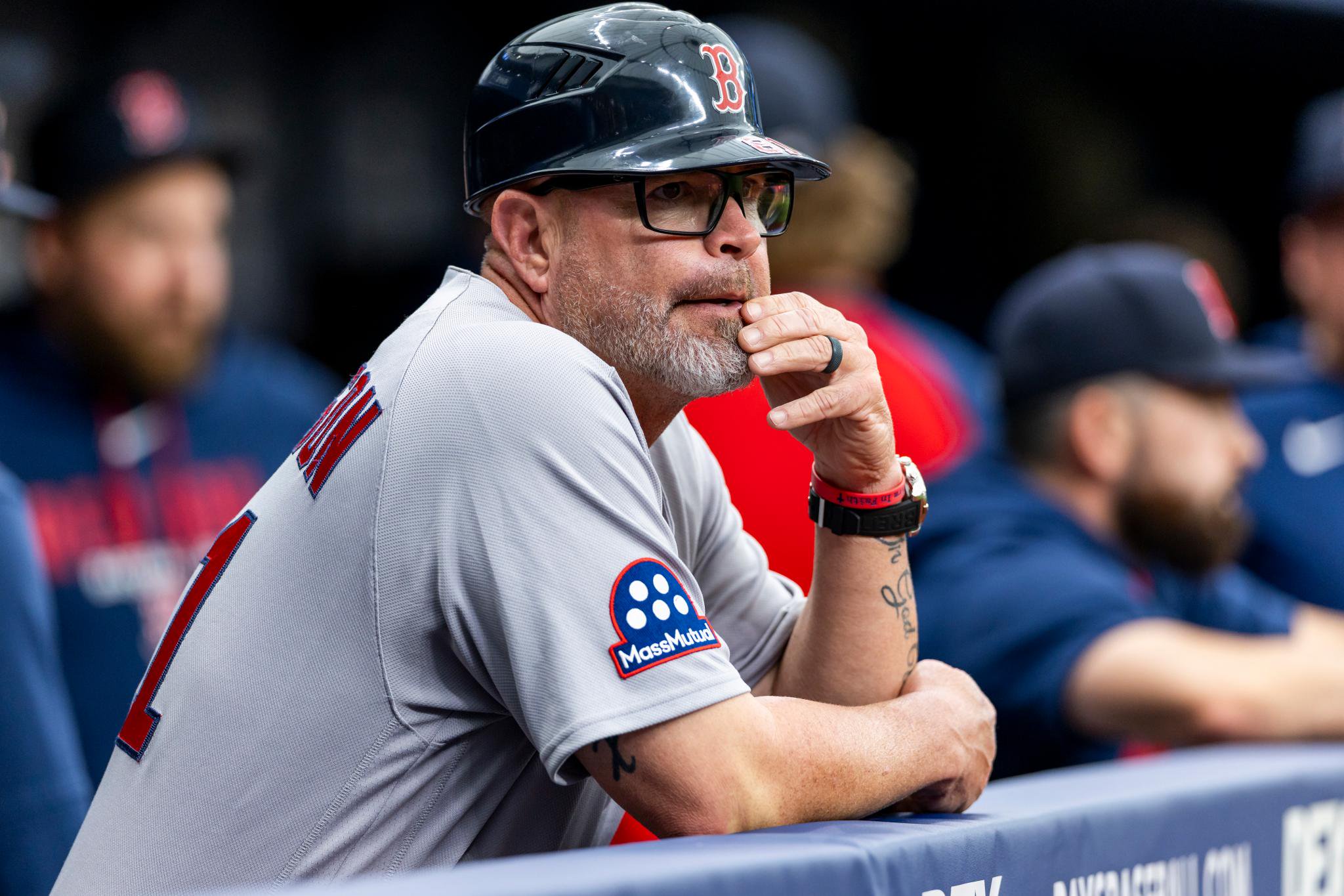 Boston Red Sox manager Alex Cora watches from the dugout during a game against the Tampa Bay Rays.