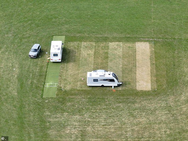 A pair of mobile homes were set up on the square itself - with one parked directly on the wicket
