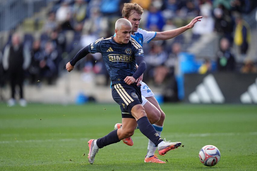 Philadelphia Union midfielder Cavan Sullivan (6) shoots the ball against Charlotte FC defender Henry Kessler (22) in the second half at Subaru Park.