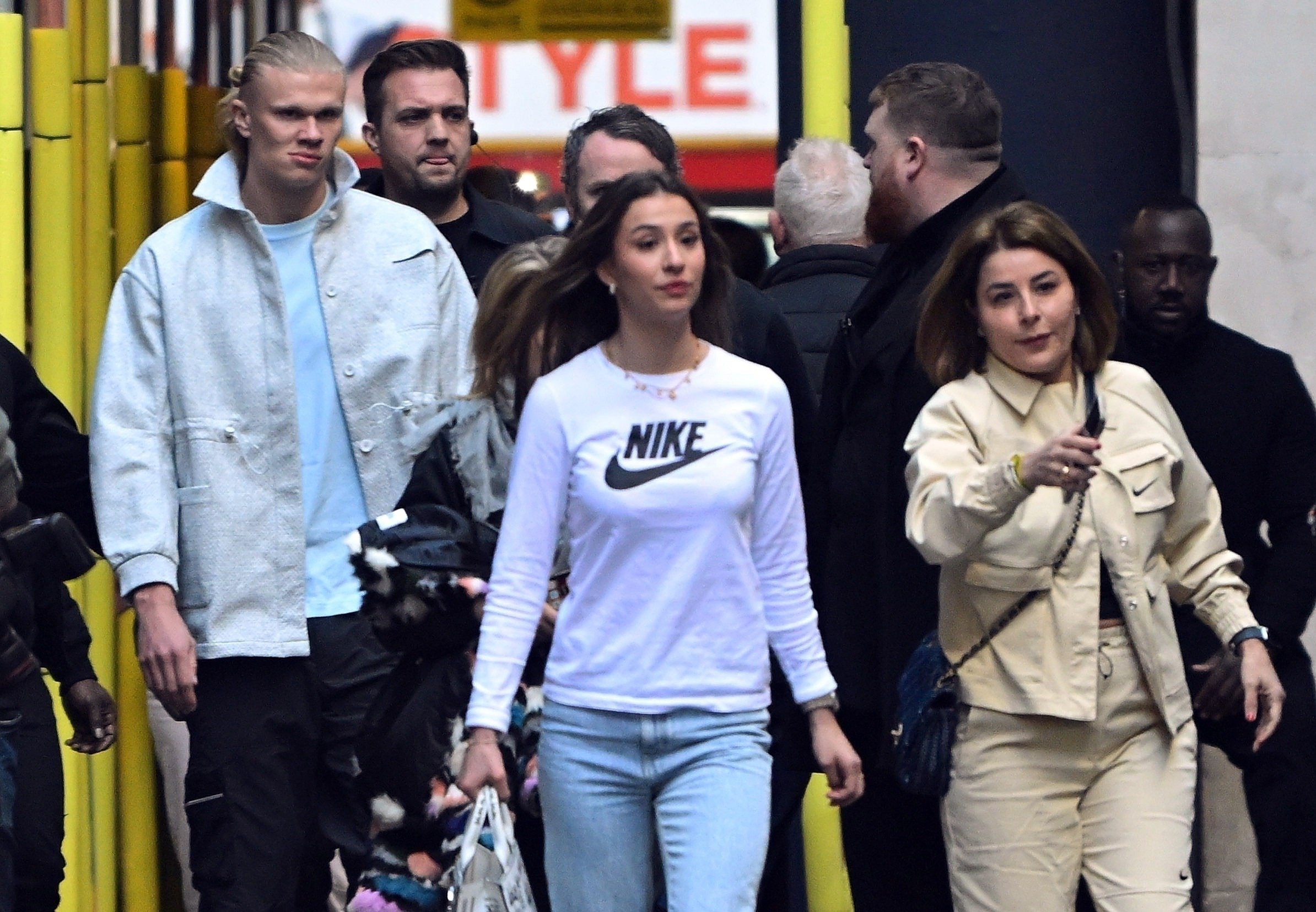 Erling Haaland, left, was seen out with girlfriend Isabel Haugseng Johansen, centre