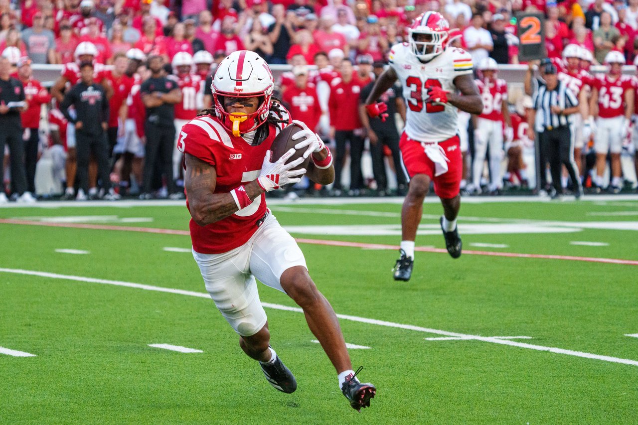 Oct 3, 2026; Lincoln, Nebraska, USA;  Nebraska Cornhuskers wide receiver Kwazi Gilmer (3) runs after a catch for a touchdown against Maryland Terrapins linebacker Carlton Smith (32) during the fourth quarter at Memorial Stadium.  Mandatory Credit: Dylan Widger-Imagn Images