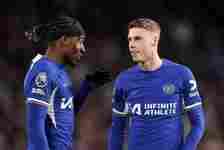 Cole Palmer and Noni Madueke  of Chelsea interact during the Premier League match between Chelsea FC and Everton FC at Stamford Bridge on April 15,...