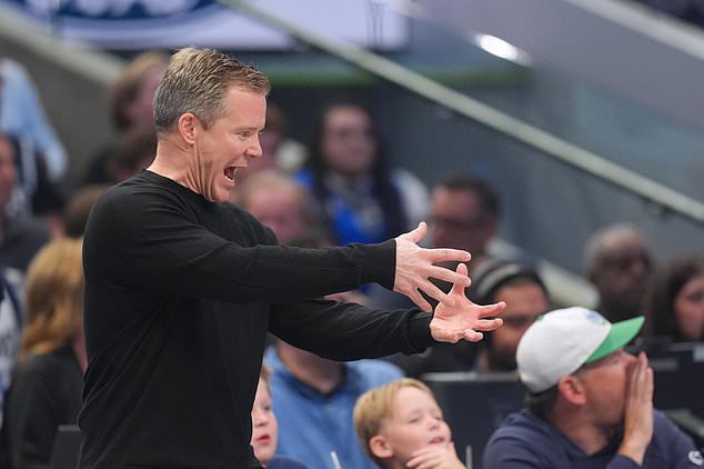 Dallas Mavericks head coach Dusty May reacts during the first half of an NBA basketball game against the San Antonio Spurs , Saturday, Oct. 24, 2026, in Dallas. (AP Photo/Julio Cortez)