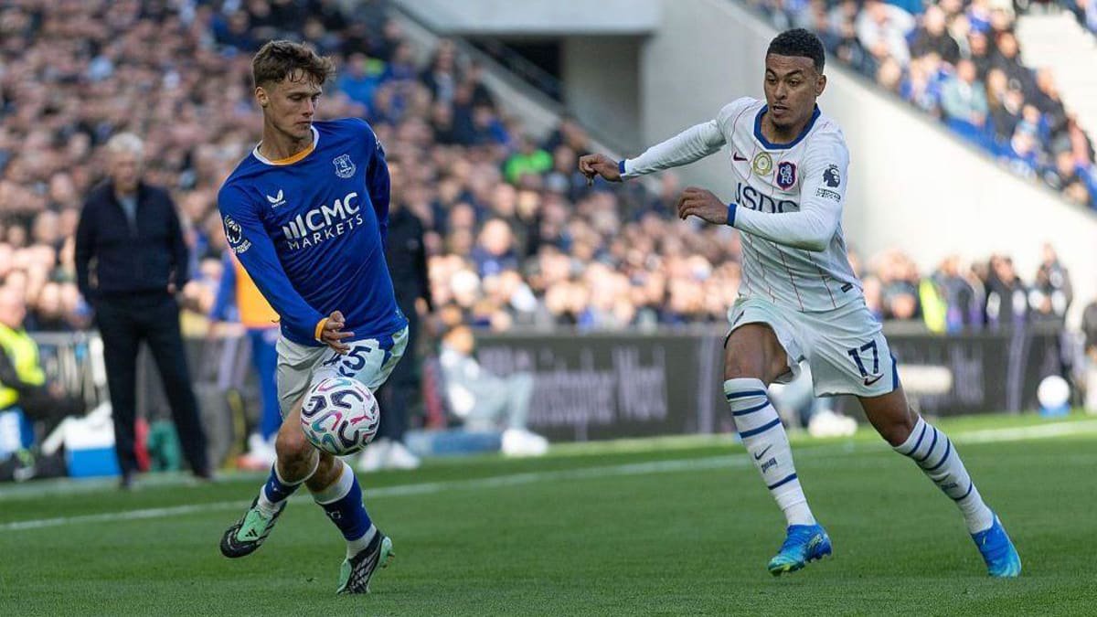 Harrison Armstrong is challenged by Morgan Rogers of Chelsea