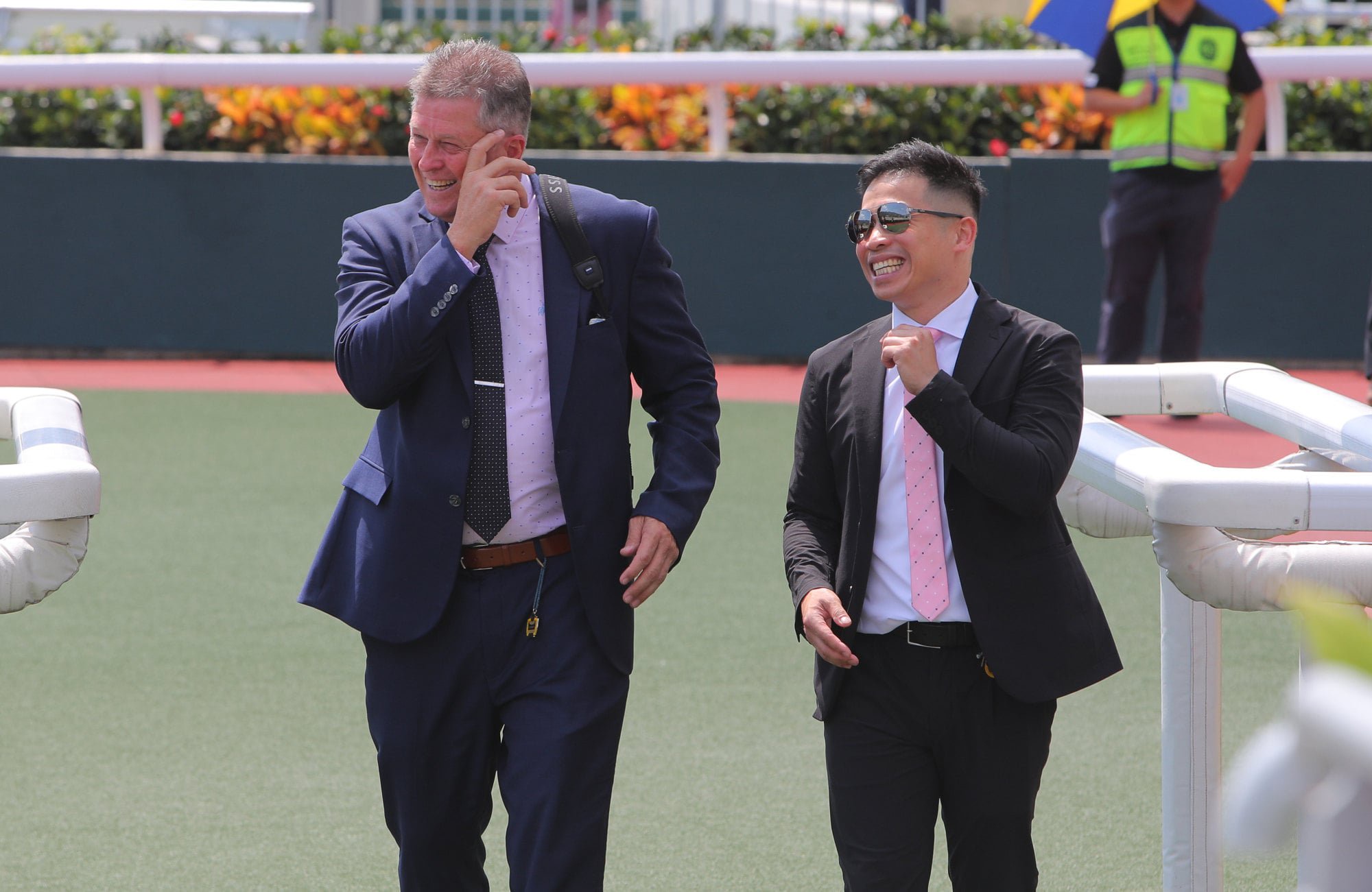 Brett Crawford (left) celebrates a Sha Tin winner.