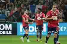 Remy Cabella of Lille celebrates his goal with Jonathan David during the Ligue 1 Uber Eats match between Lille OSC (LOSC) and Olympique de Marseill...