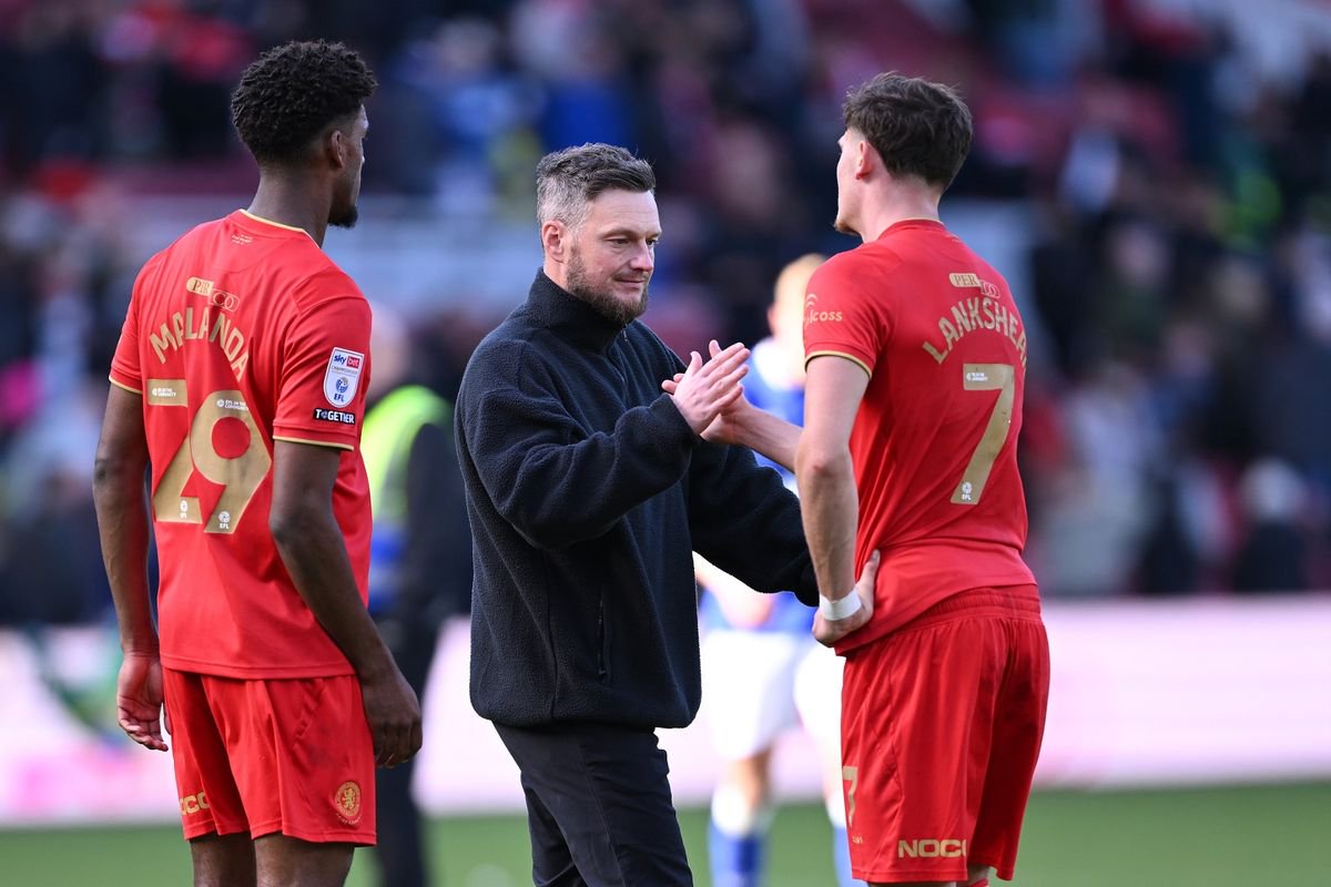 Head Coach Kim Hellberg of Middlesbrough congratulates Will Lankshear after the Cardiff City draw