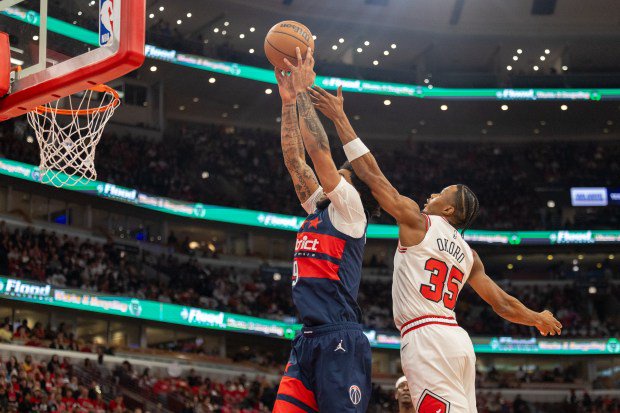 Bulls forward Isaac Okoro (35) forces a miss during the first quarter against the Wizards on Saturday, Oct. 24, 2026, at the United Center. (Arthur Maiorella/Chicago Tribune)