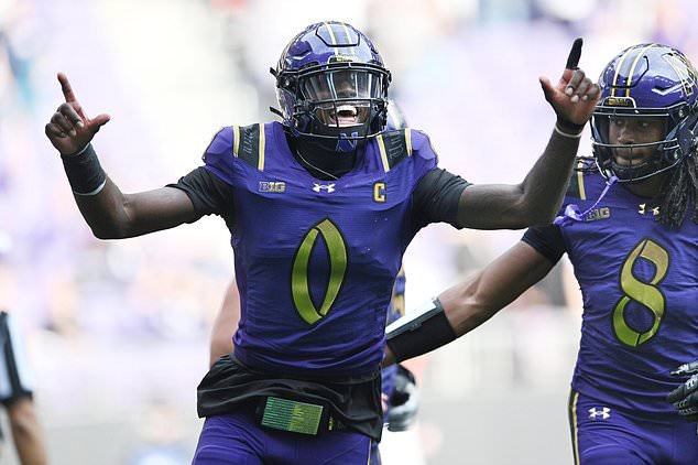 Northwestern quarterback Aidan Chiles (0) celebrates after rushing for a touchdown during the second half of an NCAA college football game against Rutgers, Saturday, Oct. 24, 2026, in Evanston, Ill. (AP Photo/Paul Beaty)