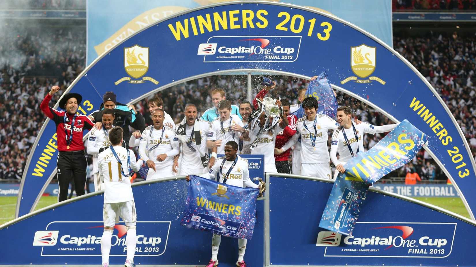 Football - Bradford City v Swansea City - Capital One Cup Final - Wembley Stadium - 12/13 - 24/2/13 Swansea City celebrate winning the Capital One Cup Final with the trophy