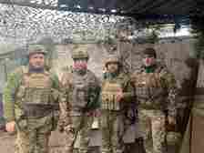 PHOTO: Col. Oleh Avtomeenko, left, with fellow soldiers in Avdiivka, Donetsk region, Ukraine, in 2019, in a handout photo.  (Oleh Avtomeenko)