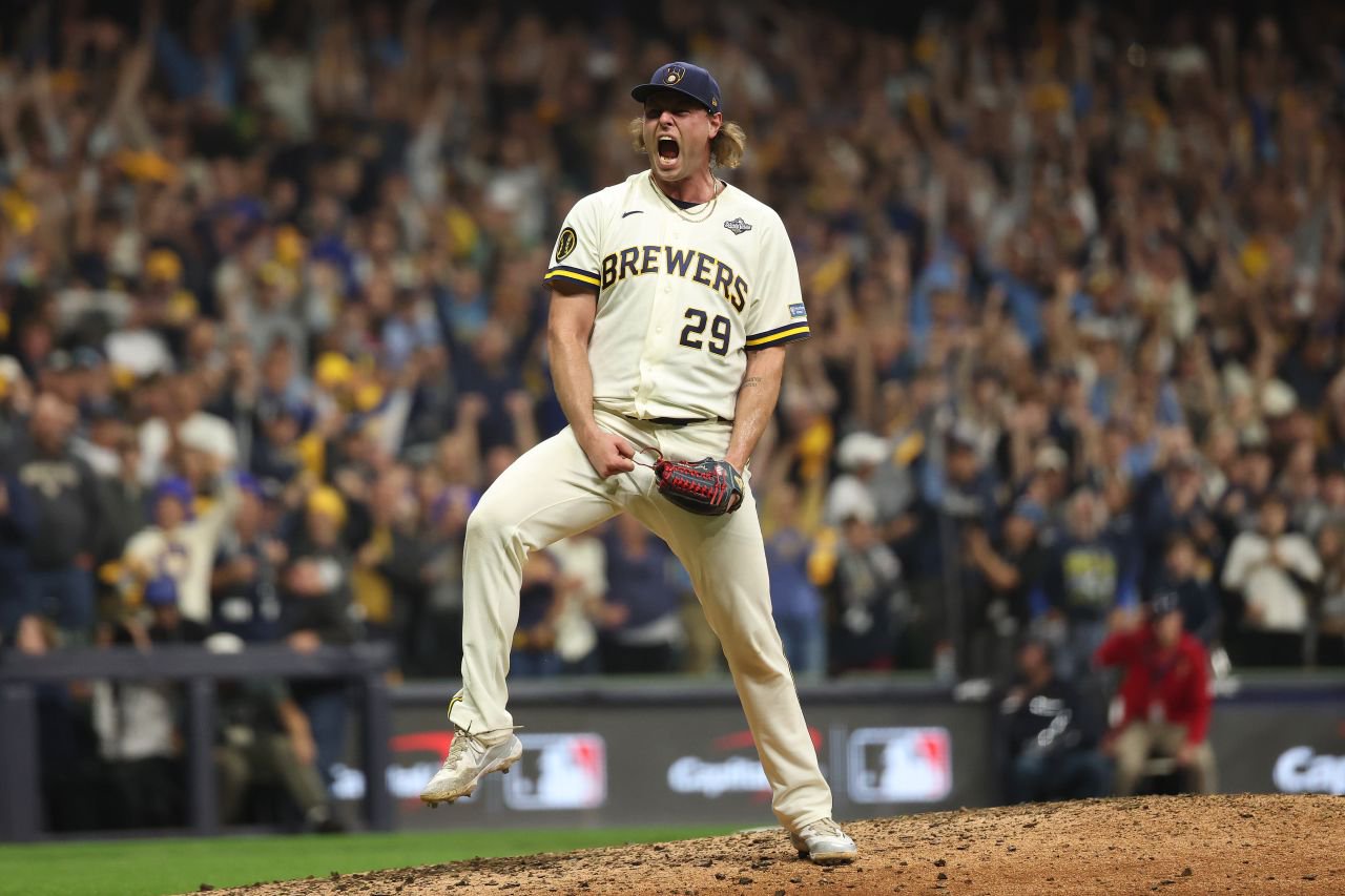 Brewers closer Trevor Megill celebrates after his strikeout ended Game 1.