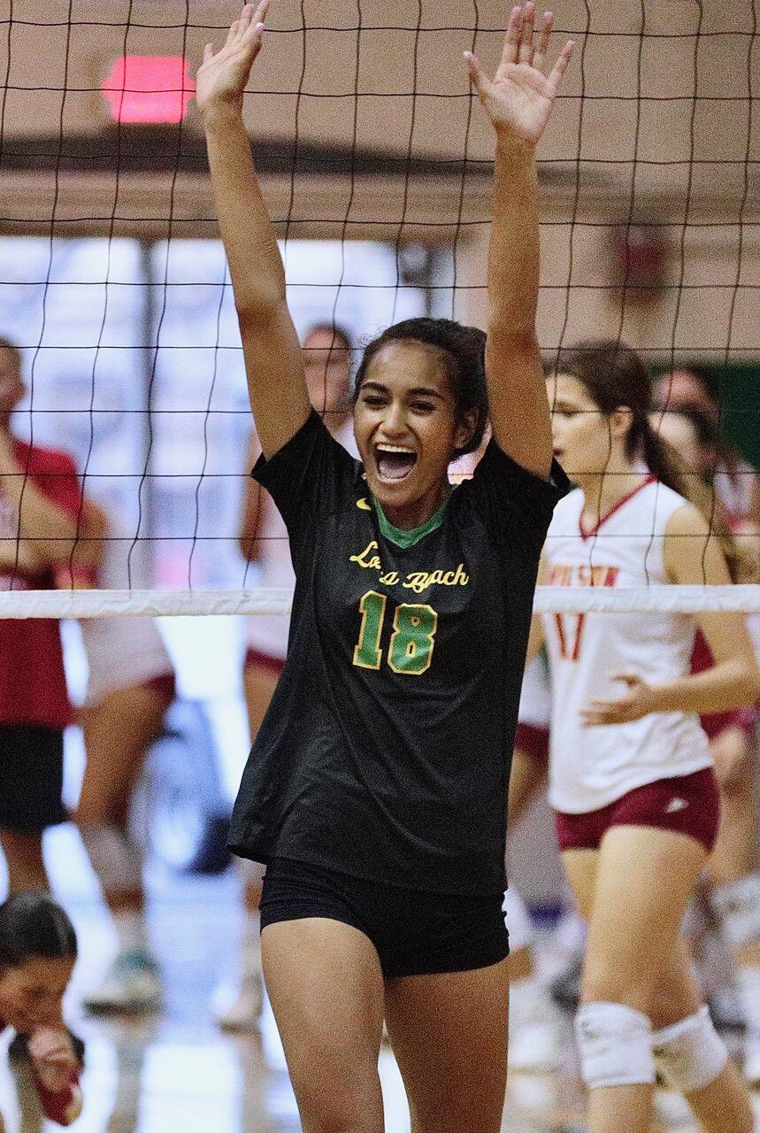 Long Beach Poly High junior Ellie Iamaleava celebrates winning a point during a recent match.