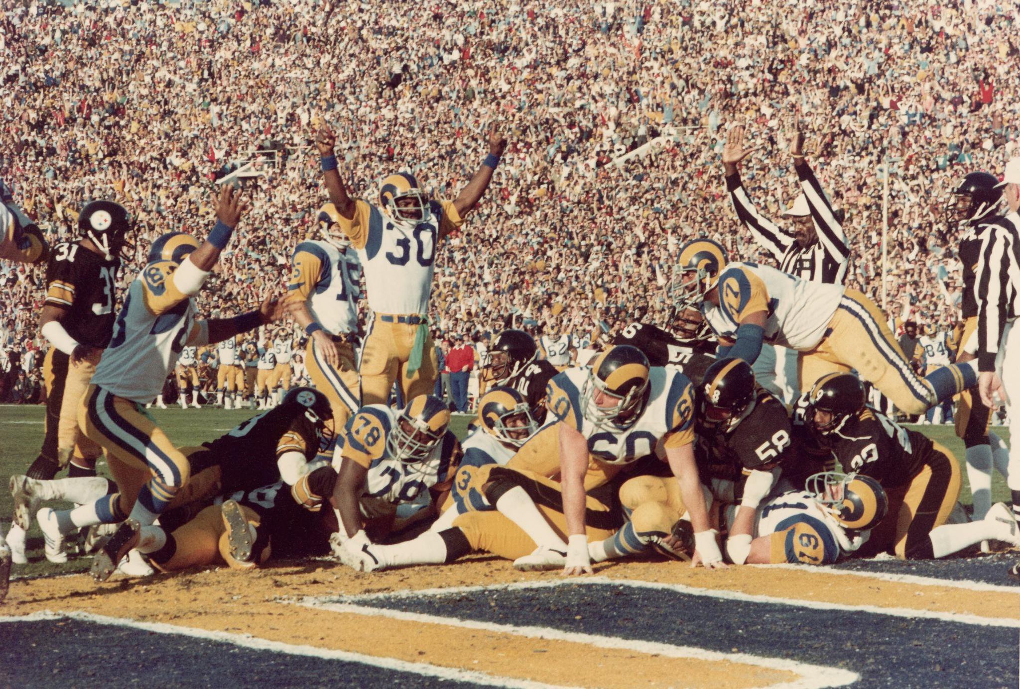 Action on the field during Super Bowl XIV featuring the Los Angeles Rams and Pittsburgh Steelers.