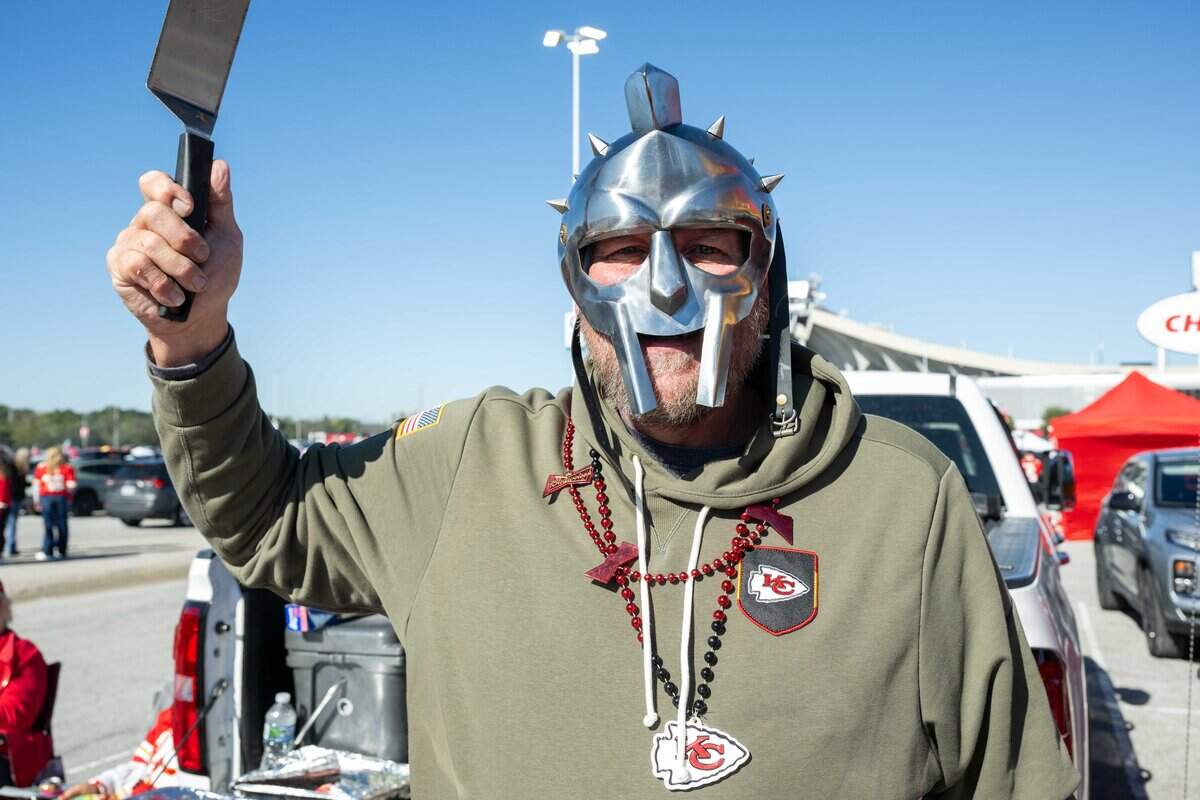 Tony Rujawitz prepares to cook at his tailgate outside the stadium prior to the Chiefs game vs. the Los Angeles Chargers, on Sunday, October 18, 2026, at Arrowhead Stadium.