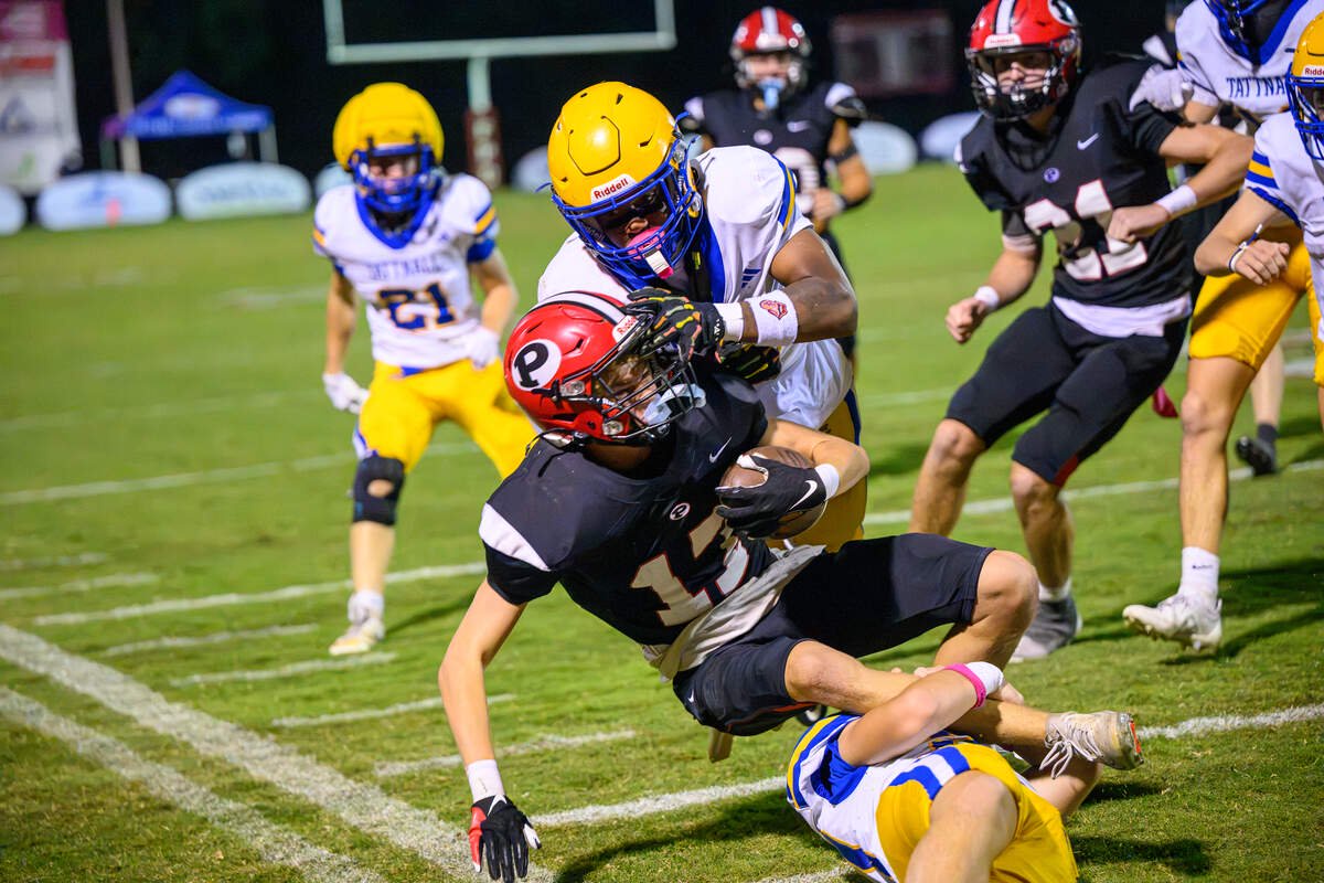 FPD’s Sam Bryant gets tackled on a kickoff return Friday night in their matchup with Tattnall.