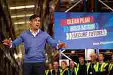 Britain's Prime Minister and Conservative Party Leader Rishi Sunak delivers a speech during a visit to the Well Healthcare Supplies warehouse during a general election campaign event in Stoke-on-Trent, northern England, on July 1, 2024.