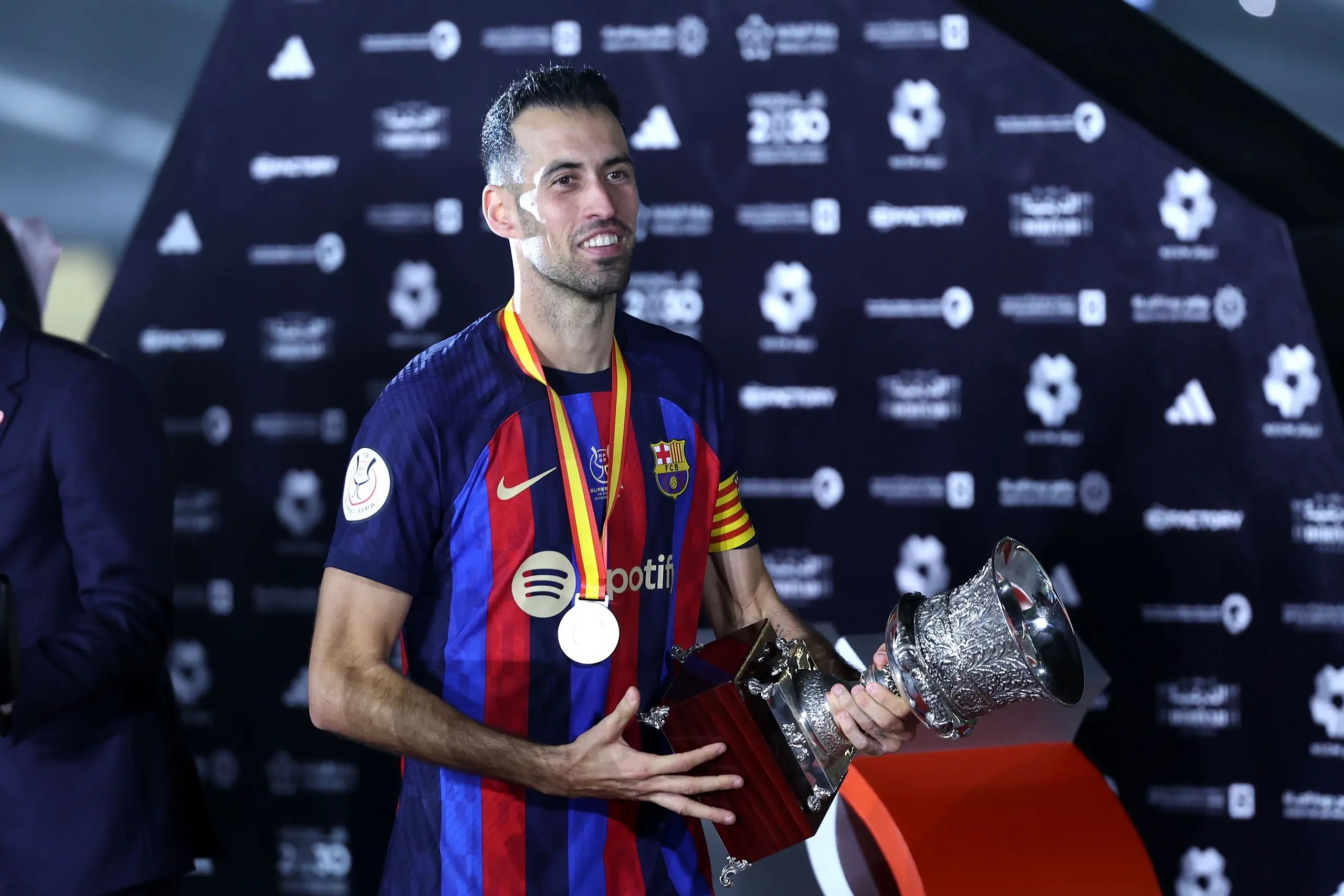 Sergio Busquets with a trophy.