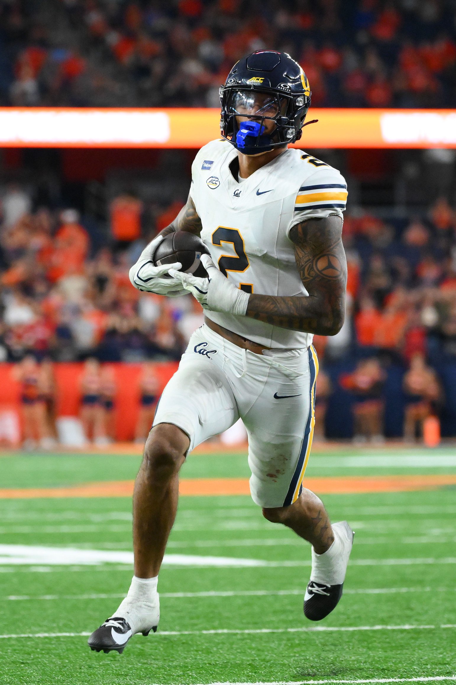 Sep 12, 2026; Syracuse, New York, USA; California Golden Bears defensive back Kingston Lopa (2) returns his interception for a touchdown during the second half against the Syracuse Orange at the JMA Wireless Dome. Mandatory Credit: Rich Barnes-Imagn Images