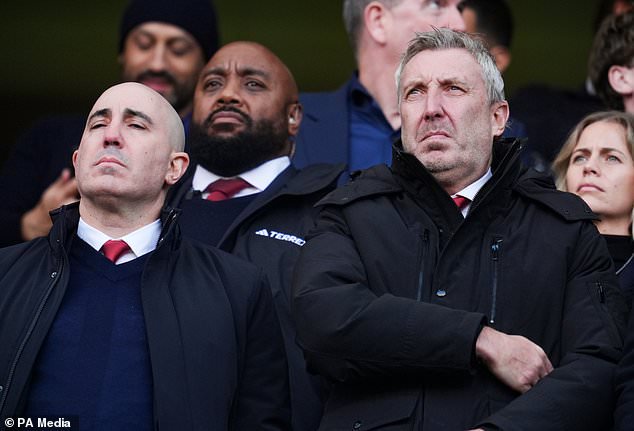 Manchester United chief executive officer Omar Berrada (left) and director of football Jason Wilcox in the stands at Stamford Bridge (Adam Davy/PA)