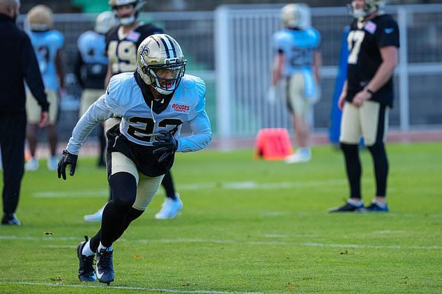 New Orleans Saints safety Julian Blackmon (23) warms up during an NFL football practice session in Versailles near Paris, Wednesday, Oct. 21, 2026. (AP Photo/Aurelien Morissard)