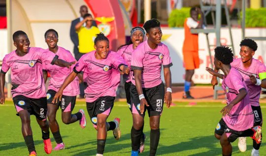 Players of Ampem Darkoa Ladies celebrating after scoring against Edo Queens