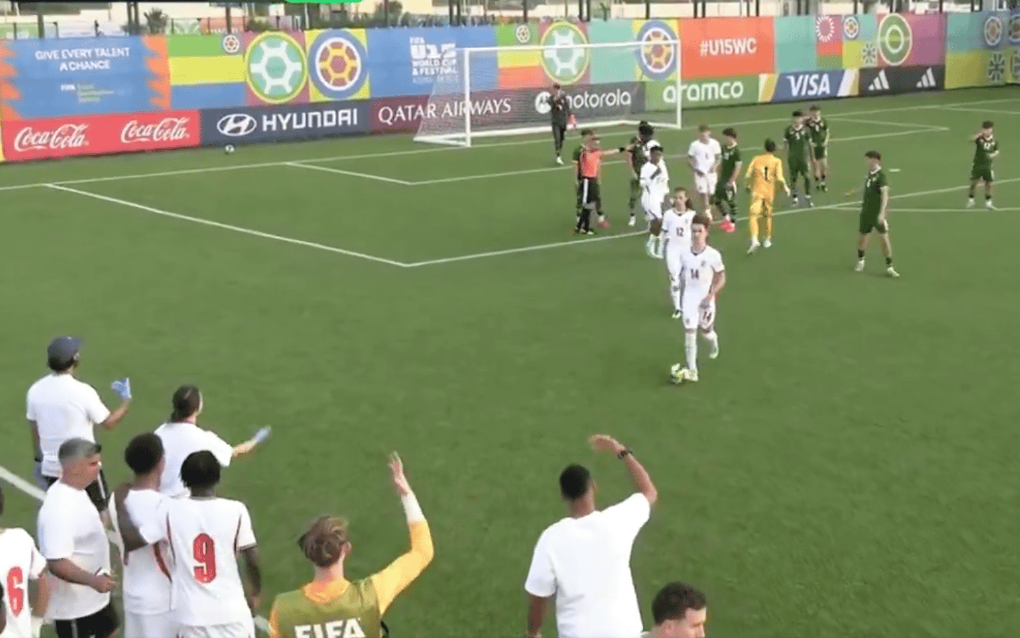 Coach Matt Thorpe beckons his squad off the pitch (FIFA+)