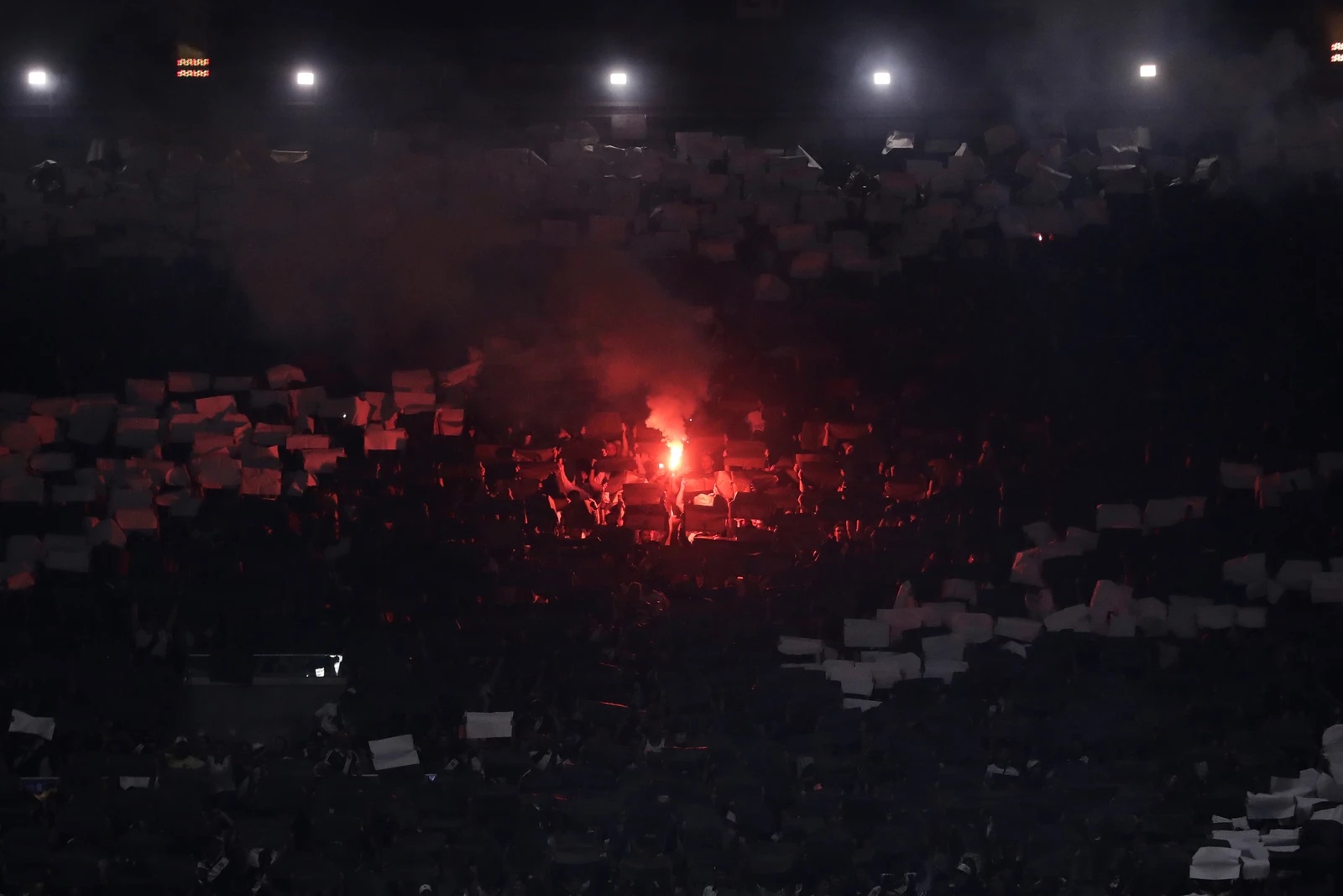 Brazil's Vasco da Gama fans hold a flare during a Copa Sudamericana second leg semifinal soccer match against Argentina's Boca Juniors in Rio de Janeiro , Oct. 20, 2026. (AP) (AP Photo/Bruna Prado)