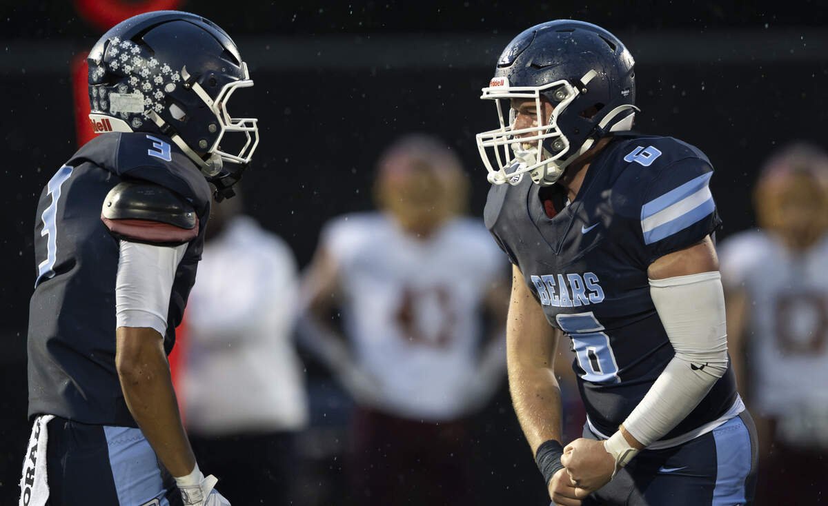 Olympia linebacker Tyler York (6) and Olympia free safety Kam Kronmeyer (3) react to a tackle for a loss against Capital High School during the first half of the game at Ingersoll Stadium, on Friday, Sept. 4, 2026, in Olympia.